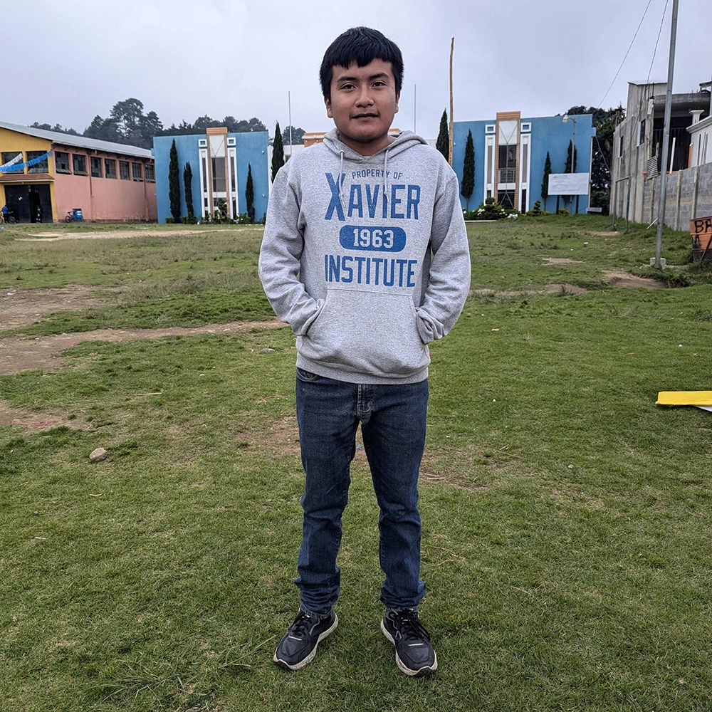 MARIO MENDEZ COROXON is 16 years old, currently in third grade, and his dream is to continue studying architecture. His favorite food is chicken and rice. In his free time, he likes to play soccer and read fantasy books. His biggest dream is to become an architect so he can help his family financially.